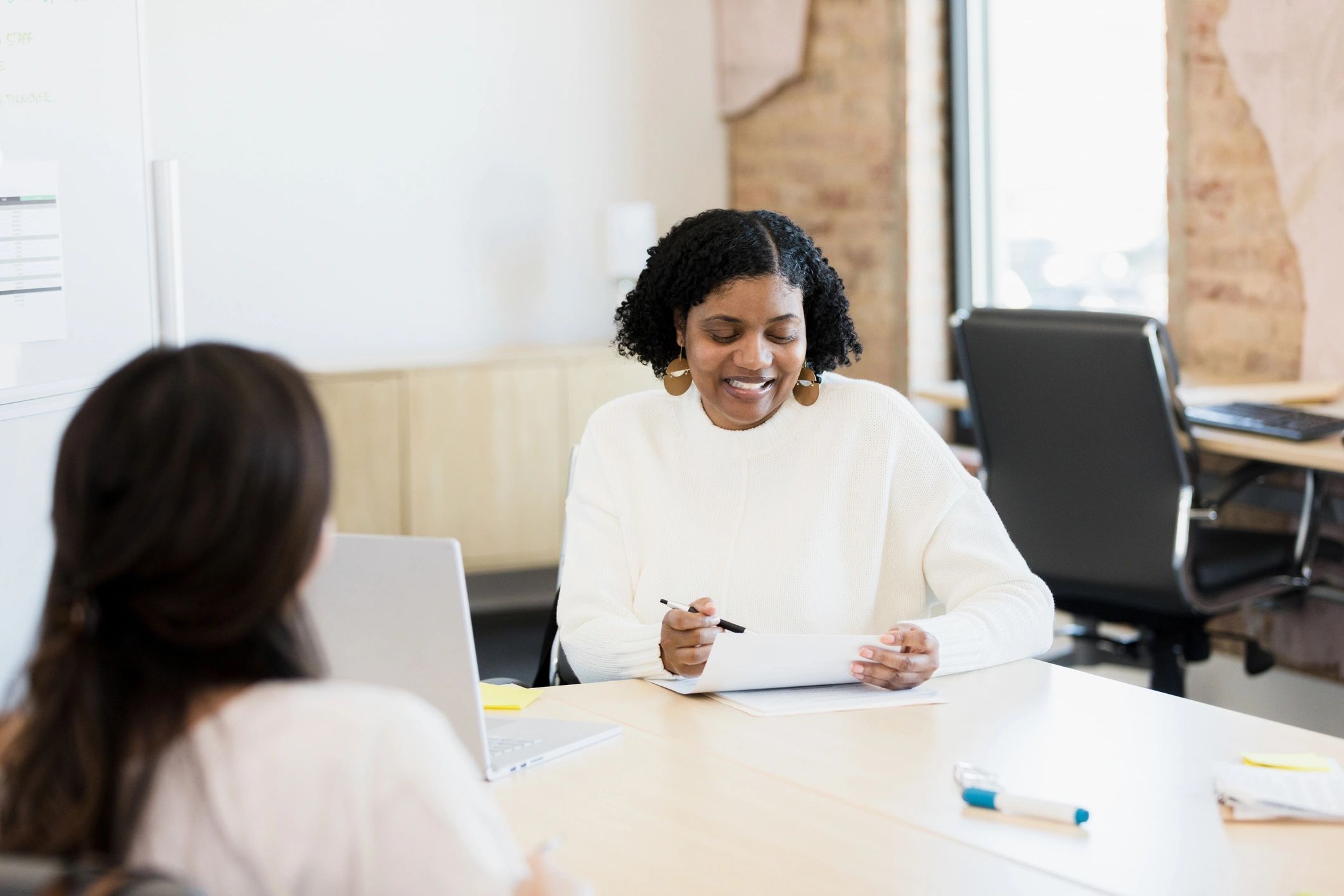 Participant meeting with a research interviewer