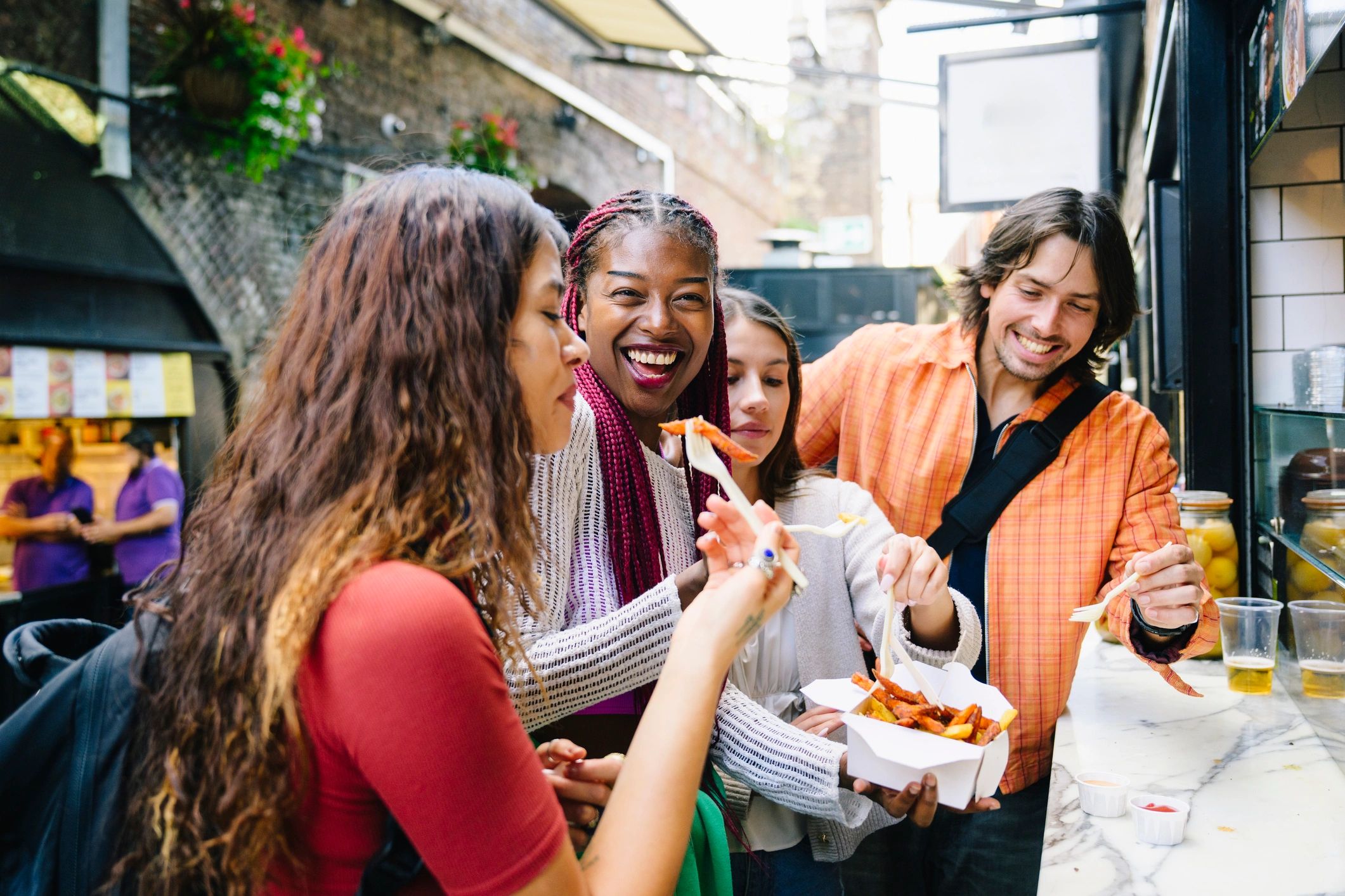 Friends enjoying a food taste test